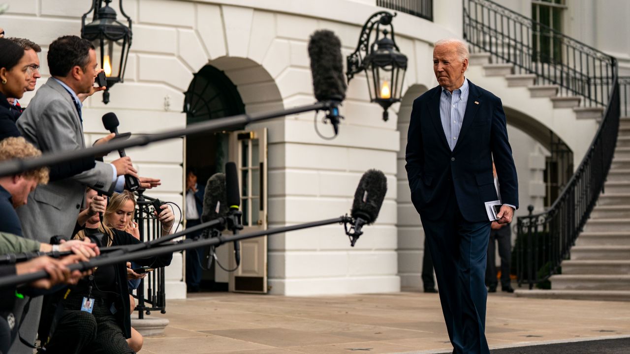 President Joe Biden speaks to the press as he prepares to board Marine One on the South Lawn of the White House on October 3