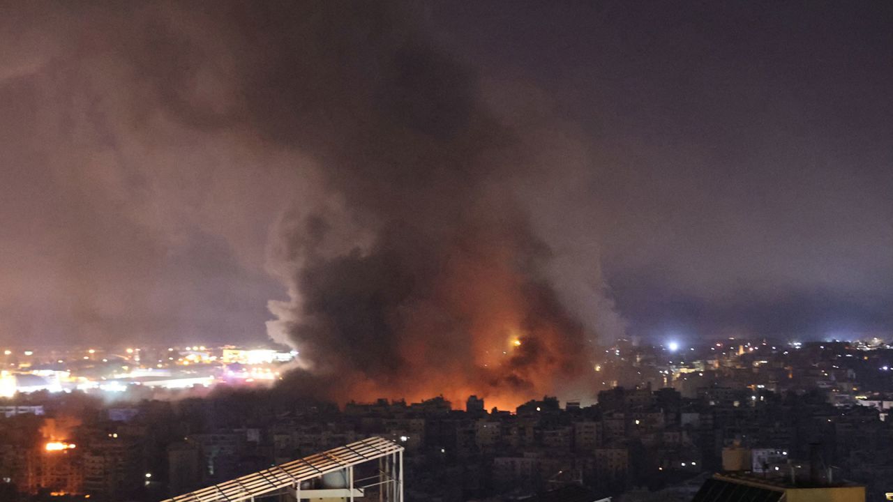 Smoke rises after an Israeli airstrike targeting an area in Beirut's southern suburb late on Thursday, October 3.)