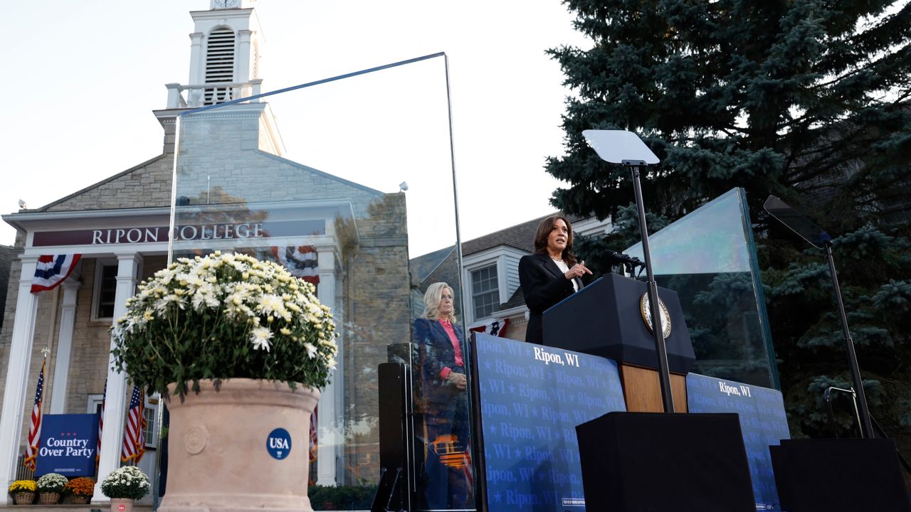 Kamala Harris speaks alongside Liz Cheney, left, during a campaign event at Ripon College in Ripon, Wisconsin, on October 3.