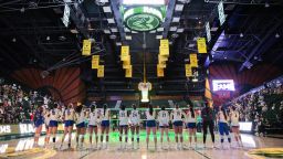 The San Jose State University Spartans line up for the playing of the national anthem and player introductions for their NCAA Mountain West women's volleyball game against the Colorado State University Rams in Fort Collins, Colo., on Thursday, Oct. 03, 2024.