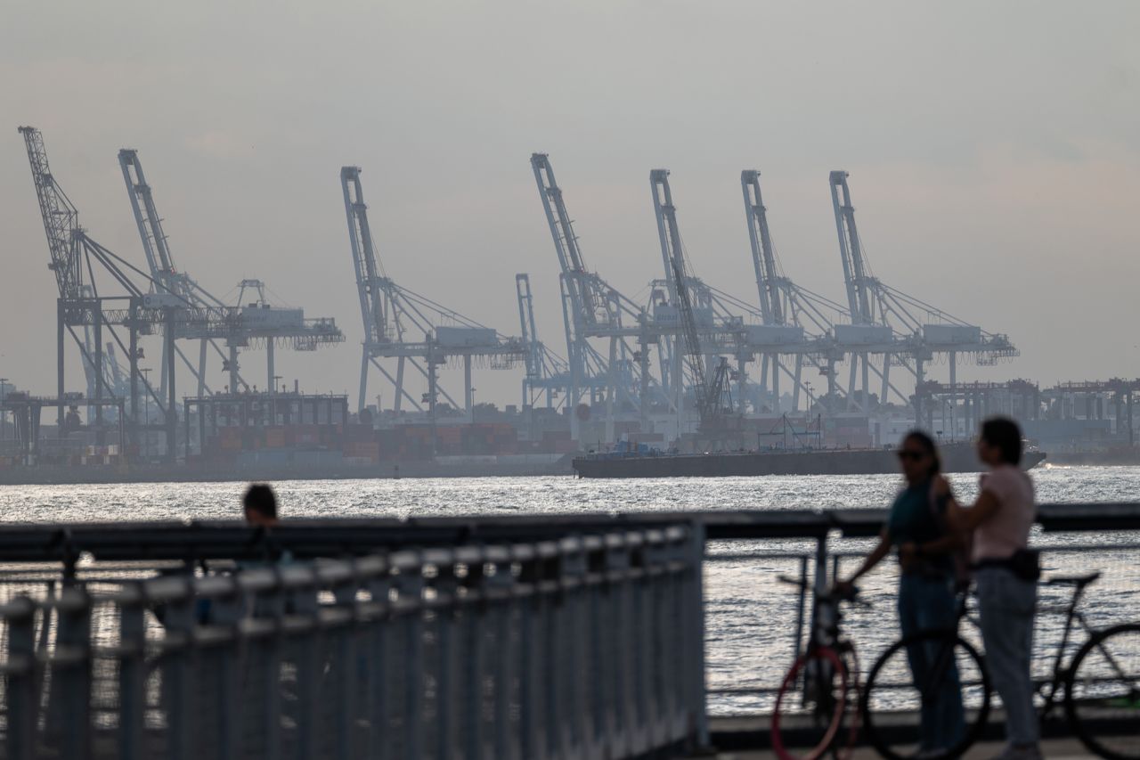 Cranes used for shipping containers rise from the Port of Newark on September 30 in New York City.