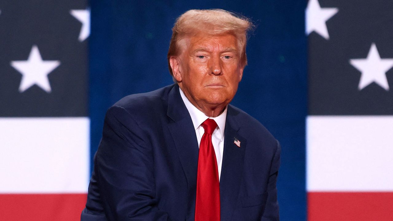 TOPSHOT - Former US President and Republican presidential candidate Donald Trump looks on during a town hall event at the Crown Complex in Fayetteville, North Carolina, on October 4, 2024. (Photo by Logan Cyrus / AFP) (Photo by LOGAN CYRUS/AFP via Getty Images)