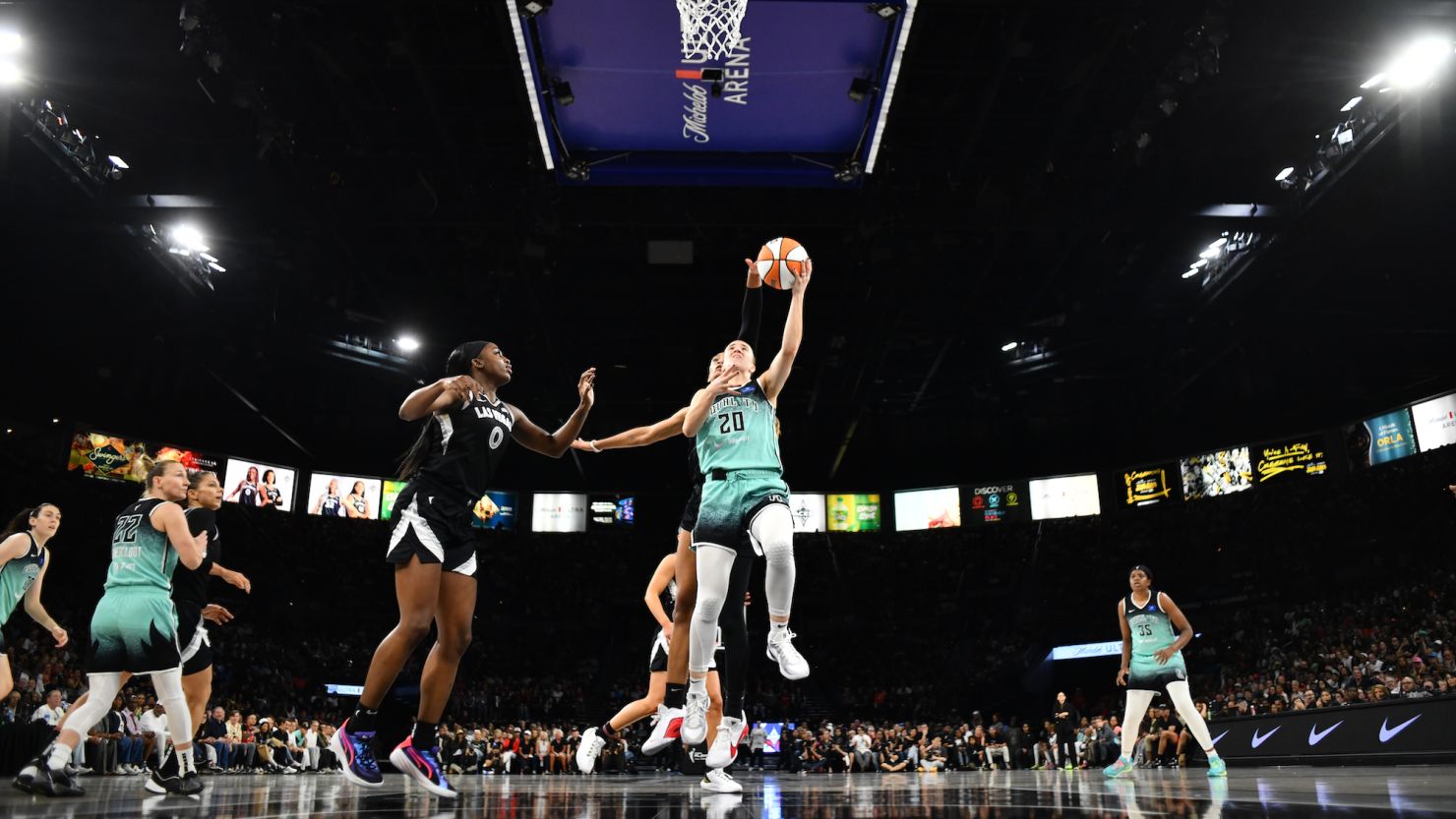 New York Liberty's Sabrina Ionescu drives to the basket against the Las Vegas Aces.