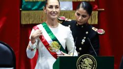 MEXICO CITY, MEXICO - OCTOBER 01: New president of Mexico Claudia Sheinbaum Pardo receives the presidential sash during the investiture ceremony as part of the presidential inauguration on October 01, 2024 in Mexico City, Mexico. Claudia Sheinbaum takes office as the first female president of Mexico following an overwhelming victory in the presidential election. (Photo by Manuel Velasquez/Getty Images)