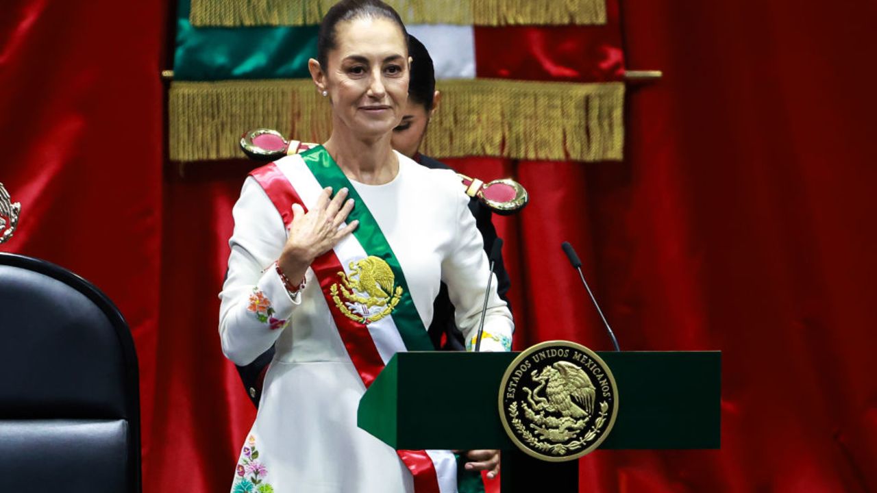 MEXICO CITY, MEXICO - OCTOBER 01: New president of Mexico Claudia Sheinbaum Pardo receives the presidential sash during the investiture ceremony as part of the presidential inauguration on October 01, 2024 in Mexico City, Mexico. Claudia Sheinbaum takes office as the first female president of Mexico following an overwhelming victory in the presidential election. (Photo by Manuel Velasquez/Getty Images)