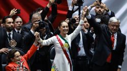 MEXICO CITY, MEXICO - OCTOBER 01: New President of Mexico Claudia Sheinbaum and the Outgoing President of Mexico Andres Manuel Lopez Obrador wave as part of the presidential inauguration on October 01, 2024 in Mexico City, Mexico. Claudia Sheinbaum takes office as the first female president of Mexico following an overwhelming victory in the presidential election. (Photo by Manuel Velasquez/Getty Images)