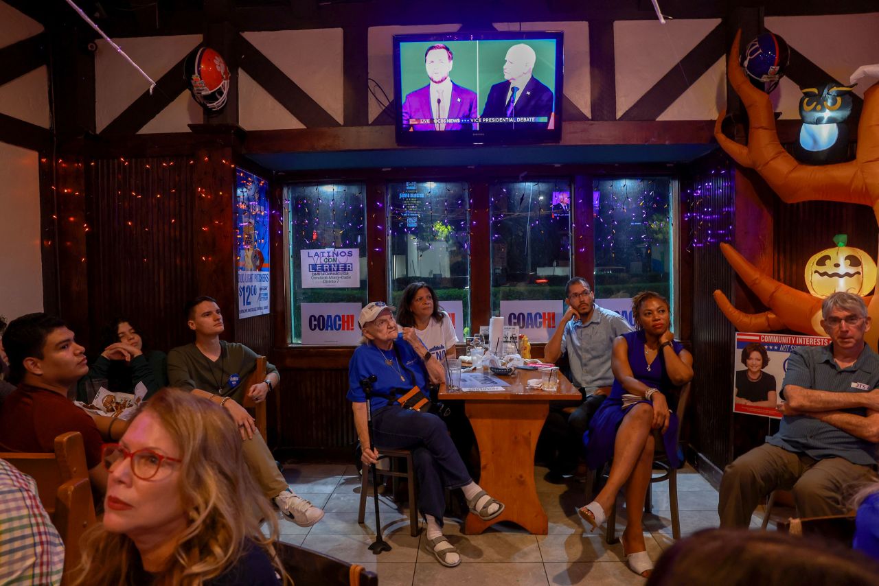 People attend a debate watch party in Kendall, Florida.