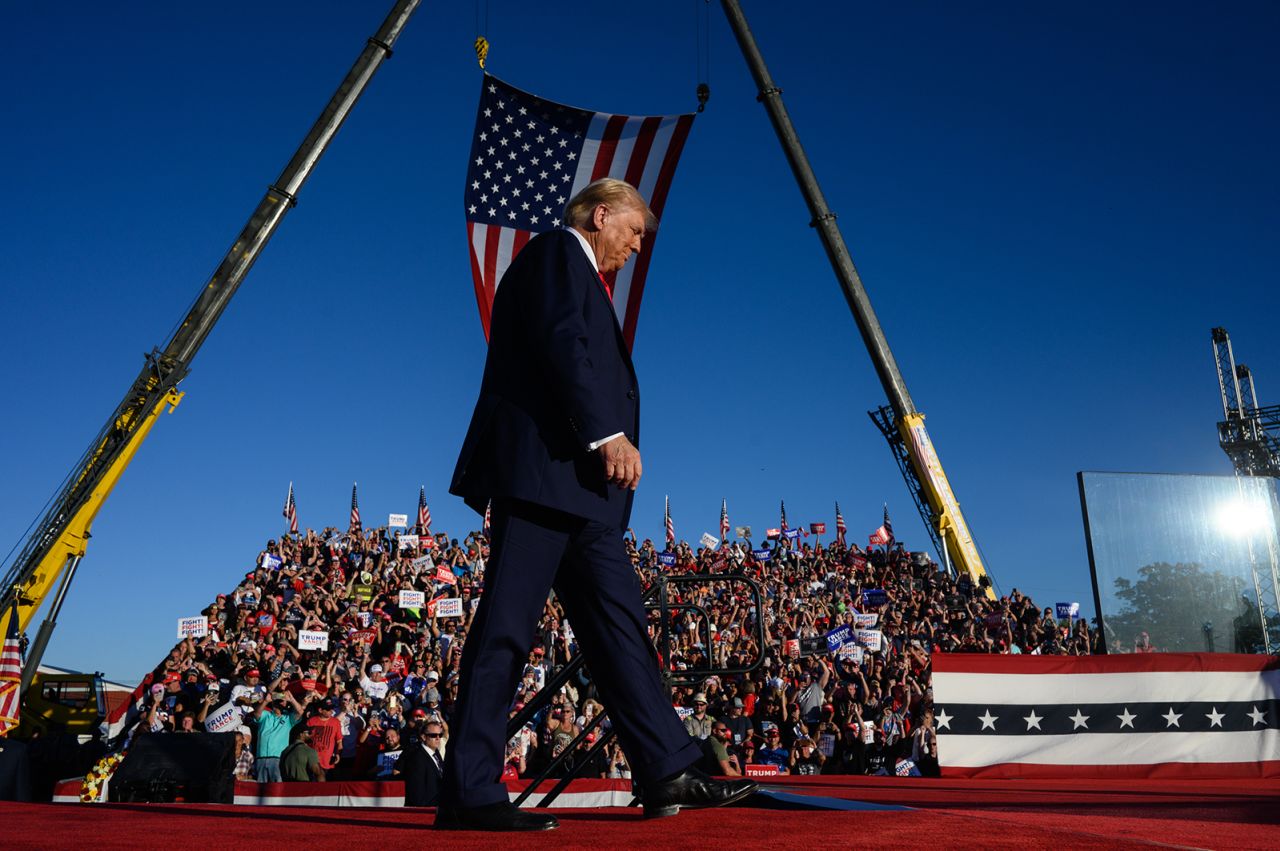 Former US President Donald Trump walks onstage during a campaign event at the Butler Farm Show in Butler, Pennsylvania, US, on Saturday.