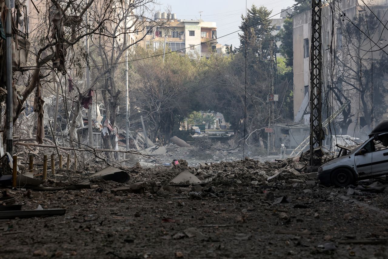 Rubble is scattered along a street in the aftermath of Israeli airstrikes on the Mreijeh neighborhood in Beirut's southern suburbs on October 6.