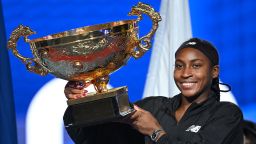 USA's Coco Gauff celebrates with the trophy after winning the women's singles final match against Czech Republic's Karolina Muchova at the China Open tennis tournament in Beijing on October 6, 2024.