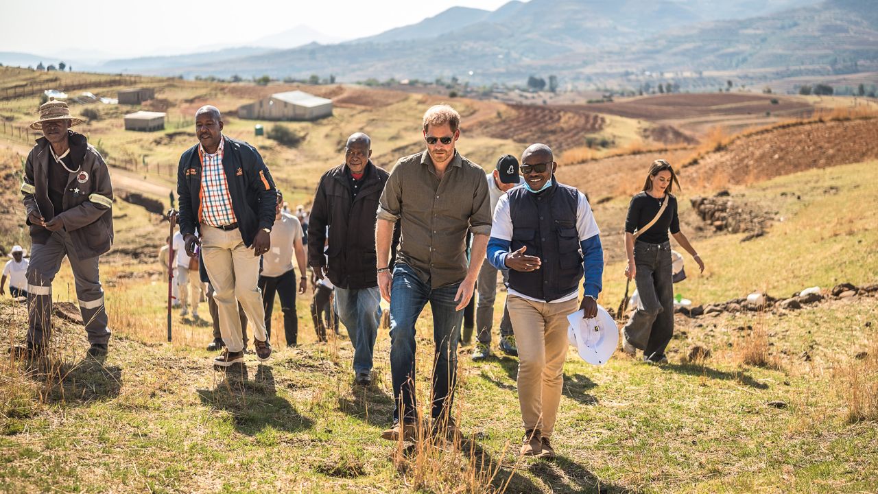MASERU, LESOTHO - OCTOBER 02: Prince Harry, Duke of Sussex (L) is welcomed by the community leader as he arrives for a visit to Matlameng – Ha Mahlehle in the Leribe region with Sentebale to meet with the community and see the climate resilience project in action on October 2, 2024 in Leribe, Lesotho. Joining the visit, alongside the Co-Founding Patrons Prince Harry, The Duke of Sussex, and Prince Seeiso of Lesotho, and Board Chair Dr. Sophie Chandauka MBE were a group of innovative international funders and business leaders interested in the Southern African region. (Photo by Brian Otieno/Getty Images for Sentebale )