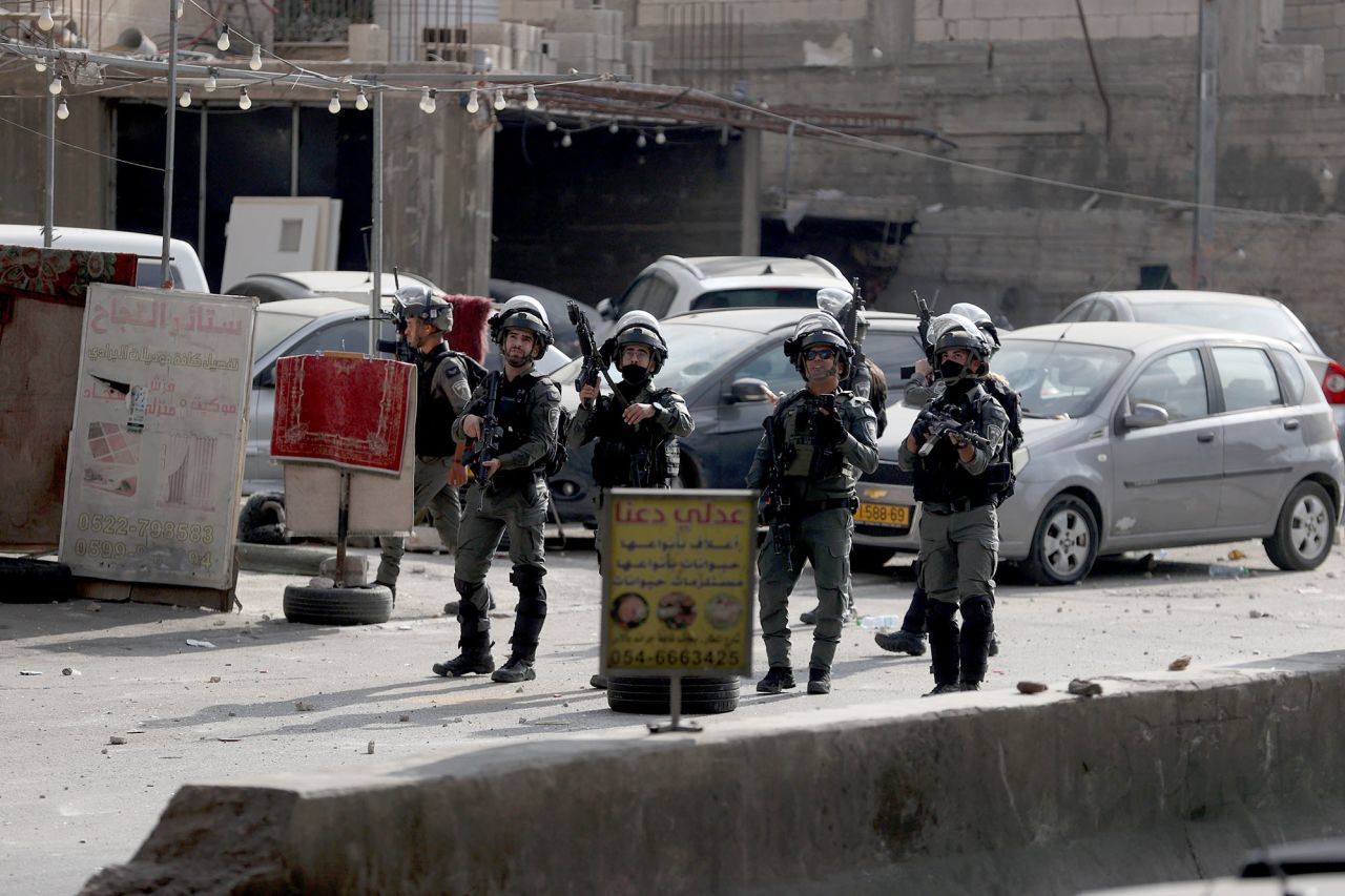 Israeli soldiers raid the Qalandiya refugee camp, north of East Jerusalem on October 7.