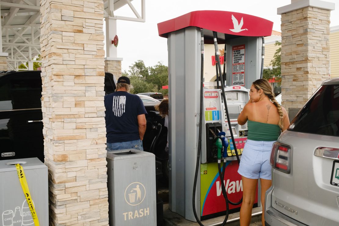 Residents purchase fuel at a gas station in St. Petersburg, Florida, ahead of Hurricane Milton's expected landfall on Monday, October 7.