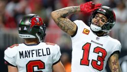 ATLANTA, GEORGIA - OCTOBER 03: Mike Evans #13 of the Tampa Bay Buccaneers celebrates with Baker Mayfield #6 after scoring a touchdown against the Atlanta Falcons during the second quarter at Mercedes-Benz Stadium on October 03, 2024 in Atlanta, Georgia. (Photo by Kevin C. Cox/Getty Images)