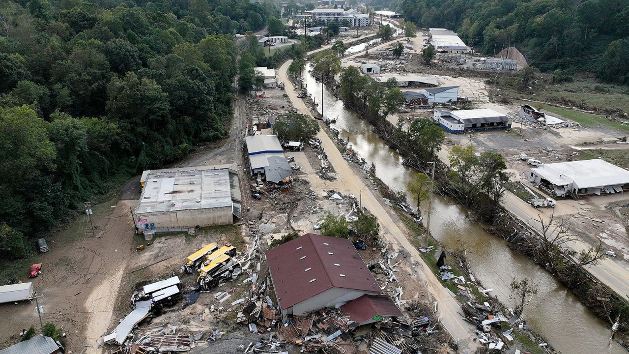 In an aerial view, flood damage wrought by Hurricane Helene is seen along the Swannanoa River on October 3, 2024 in Asheville, North Carolina.