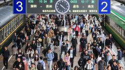 The photo taken on October 7, 2024 shows people arriving at Nanjing railway station after the National Day holidays in Nanjing, in eastern China's Jiangsu province. (Photo by STRINGER / AFP) / China OUT (Photo by STRINGER/AFP via Getty Images)