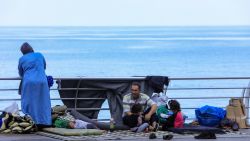 A displaced family sit with their belongings at central Beirut's Ain al-Mreisseh seaside promenade on October 8, 2024. Intense Israeli attacks may have forced up to a million people to flee parts of Lebanon in possibly the worst displacement crisis in the tiny country's history, Lebanon's Prime Minister Najib Mikati said on September 29. (Photo by AFP) (Photo by -/AFP via Getty Images)