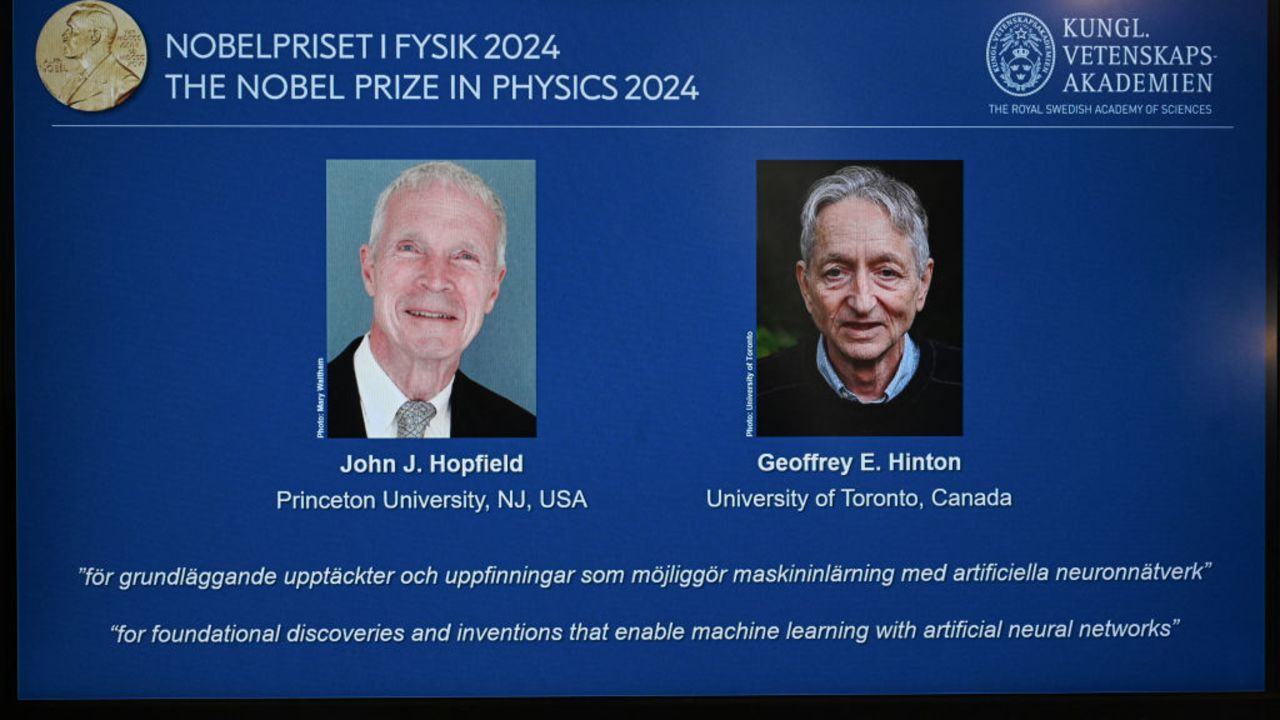 A screen shows the laureats of the 2024 Nobel Prize in Physics, US physicist John J Hopfield and Canadian-British computer scientist and cognitive psychologist Geoffrey E Hinton, during the announcement by the Royal Swedish Academy of Sciences in Stockholm, Sweden on October 8, 2024. The Royal Swedish Academy of Sciences has decided to award the 2024 Nobel Prize in Physics US physicist John J Hopfield and Canadian-British computer scientist and cognitive psychologist Geoffrey E Hinton "for foundational discoveries and inventions that enable machine learning with artificial neural networks." (Photo by Jonathan NACKSTRAND / AFP) (Photo by JONATHAN NACKSTRAND/AFP via Getty Images)