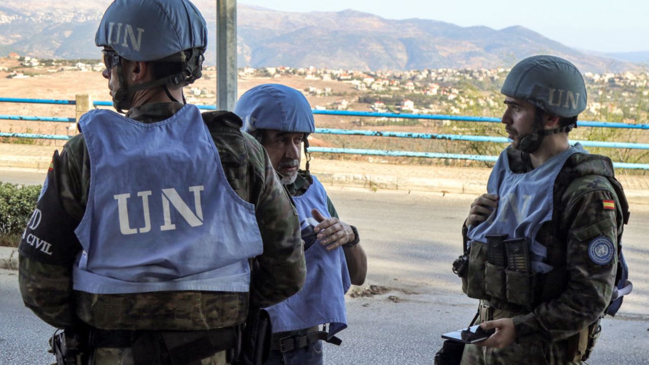 Spanish peacekeepers of the United Nations Interim Force in Lebanon (UNIFIL) coordinate their patrol with the Lebanese Military Police, in Marjayoun in south Lebanon on October 8, 2024. (Photo by AFP) (Photo by -/AFP via Getty Images)