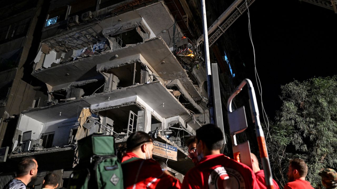 A residential building is seen damaged by an Israeli air strike in the Mazzeh suburb of Syria's capital Damascus on Tuesday.