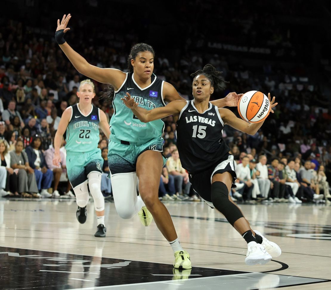 Tiffany Hayes (No. 15) of the Las Vegas Aces fights for the basket against Nyara Sabally of the New York Liberty during the 2024 WNBA Playoffs.