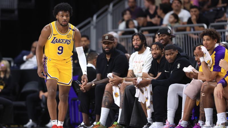 Bronny James makes his NBA preseason debut while LeBron watches from the bench