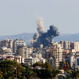 A smoke cloud erupts following an Israeli air strike on a village near Lebanon's southern city of Tyre on October 9.