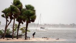 SARASOTA, FLORIDA - OCTOBER 9: A person fishes as Hurricane Milton approaches on October 9, 2024 in Sarasota, Florida. Milton, which comes just after the recent catastrophic hurricane Helene, will hit Florida's central Gulf Coast and is expected to make landfall with destructive winds and flooding. (Photo by Sean Rayford/Getty Images)