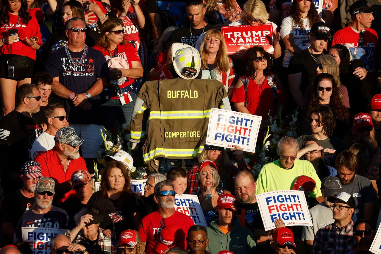 A firefighter's turnout gear marks the spot where Corey Comperatore was killed on July 13 during an attempted assassination on former President Donald Trump during campaign rally in Butler, Pennsylvania, on Saturday.