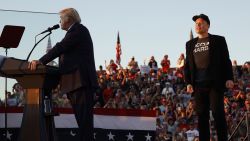 Elon Musk steps onto stage as Republican presidential nominee, former President Donald Trump addresses a campaign rally from behind bullet resistant glass at the Butler Farm Show fairgrounds on October 05, 2024 in Butler, Pennsylvania. This is the first time that Trump has returned to Butler since he was injured during an attempted assassination on July 13.