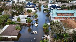 A drone image shows a flooded street due to Hurricane Milton in Siesta Key, Florida, on October 10, 2024. At least four people were confirmed killed as a result of two tornadoes triggered by Hurricane Milton on the east coast of the US state of Florida, local authorities said Thursday. (Photo by Miguel J. Rodriguez Carrillo / AFP) (Photo by MIGUEL J. RODRIGUEZ CARRILLO/AFP via Getty Images)