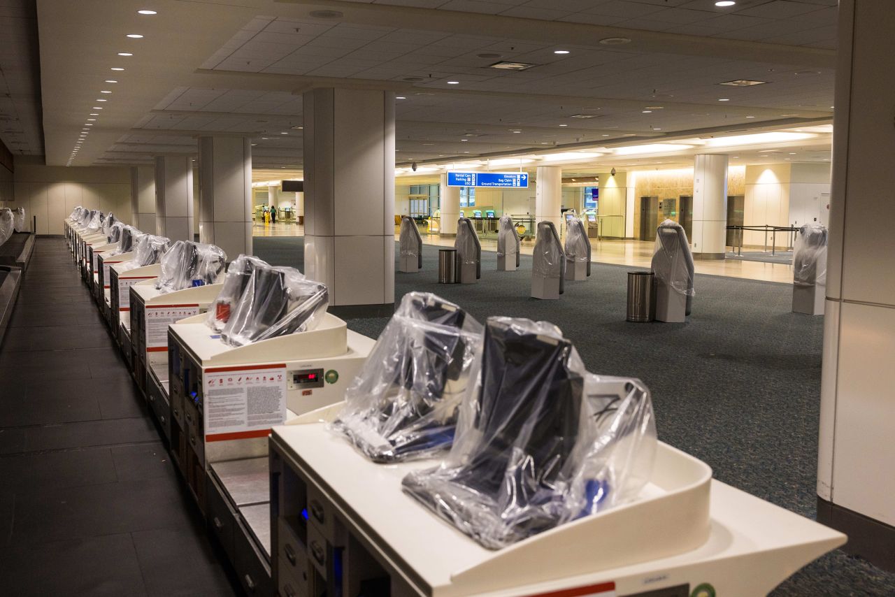 ORLANDO, FLORIDA - OCTOBER 10: A deserted indoor terminal at International Airport after Hurricane Milton passed through the area on October 10, 2024 in Orlando, Florida. The storm made landfall as a Category 3 hurricane in the Siesta Key area of Florida, causing damage and flooding throughout Central Florida. (Photo by Saul Martinez/Getty Images)