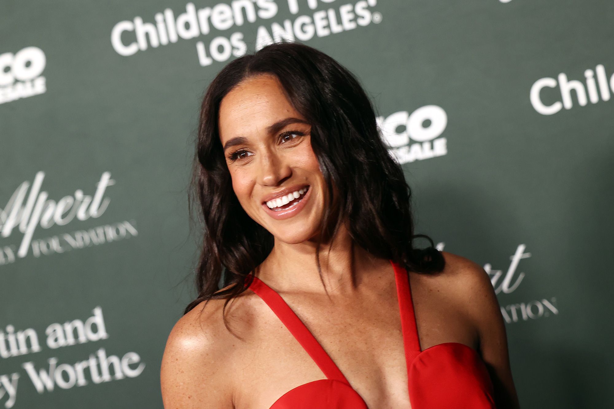 Look of the Week: Meghan, Duchess of Sussex’s striking red gown, worn at a charity gala on Saturday, isn’t entirely new