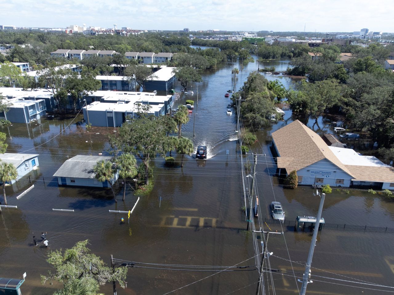 A police vehicle moving through flooded streets in Tampa, Florida, on Thursday.