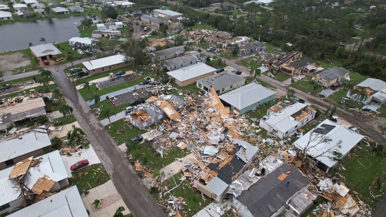 An aerial view shows destruction at the Spanish Lakes country club in Fort Pierce, Florida, in the aftermath of Hurricane Milton on October 10, 2024. At least 10 people were dead after Hurricane Milton smashed into Florida, US authorities said, after the monster weather system sent tornados spinning across the state and flooded swaths of the Tampa Bay area. (Photo by John Falchetto / AFP) (Photo by JOHN FALCHETTO/AFP via Getty Images)