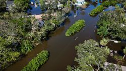 Neighborhoods are inundated in the aftermath of Hurricane Milton in Lake Maggiore, Florida, on October 10, 2024. At least 10 people were dead after Hurricane Milton smashed into Florida, US authorities said, after the monster weather system sent tornados spinning across the state and flooded swaths of the Tampa Bay area. (Photo by Miguel J. Rodriguez Carrillo / AFP) (Photo by MIGUEL J. RODRIGUEZ CARRILLO/AFP via Getty Images)