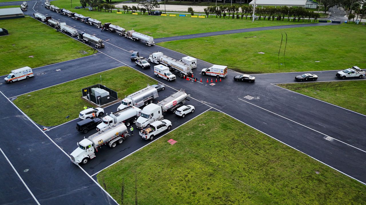 First responders fill up with gas from tankers in Tampa, Florida, on October 10.