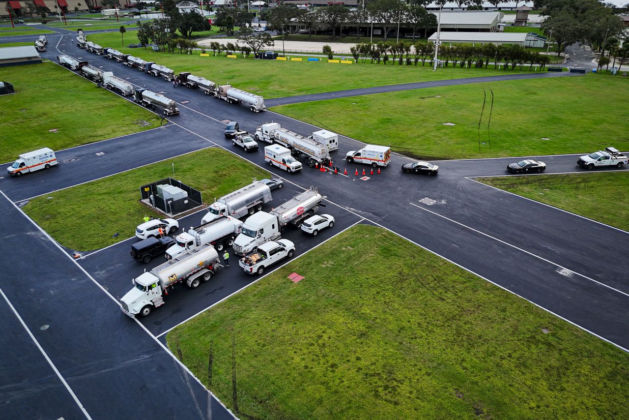 First responders fill up with gas from tankers in Tampa, Florida, on October 10.