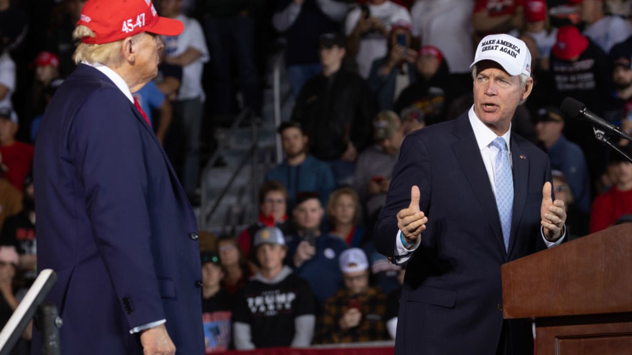 JUNEAU, WISCONSIN - OCTOBER 06: Republican presidential nominee former President Donald Trump listens as Senator Ron Johnson (R-WI) speaks during a rally at Dodge County Airport on October 06, 2024 in Juneau, Wisconsin. The rally follows one yesterday where Trump addressed thousands of supporters near Butler, Pennsylvania, at the site where he was wounded by a gunshot on July 13. (Photo by Scott Olson/Getty Images)