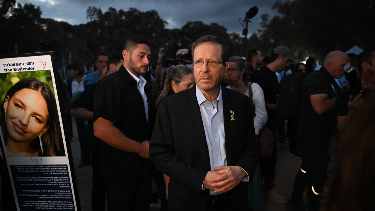 The President of Israel Isaac Herzog and his wife visit relatives of victims and attend the one year memorial ceremony at the Nova festival memorial to mark one the first anniversary since Hamas attacked one year ago, in Re’im, Israel, on October 7.