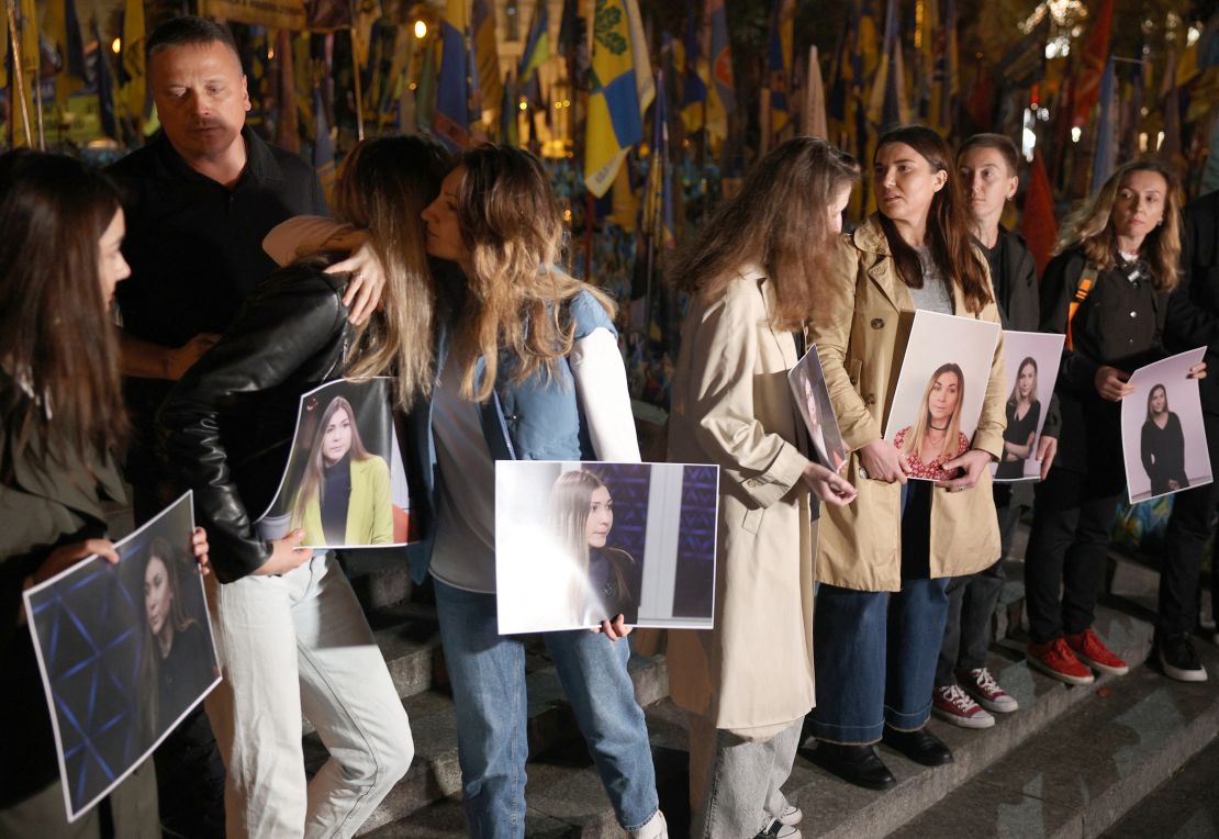 Colleagues of Victoria Roshchyna attend a vigil in Kyiv, on October 11, 2024.