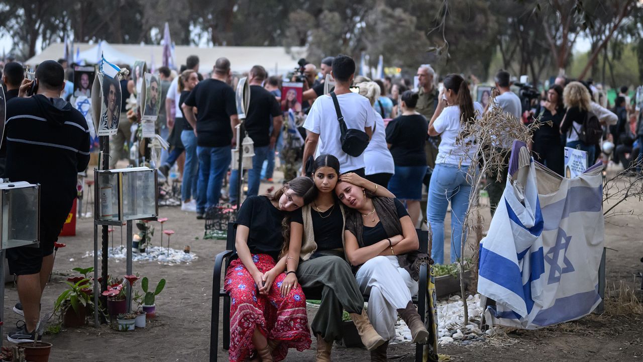 Family members and friends of the lost and kidnapped gather at the site of the Nova Festival to mark the one year anniversary of the attacks by Hamas, on October 7, 2024 in Re'im, Israel.