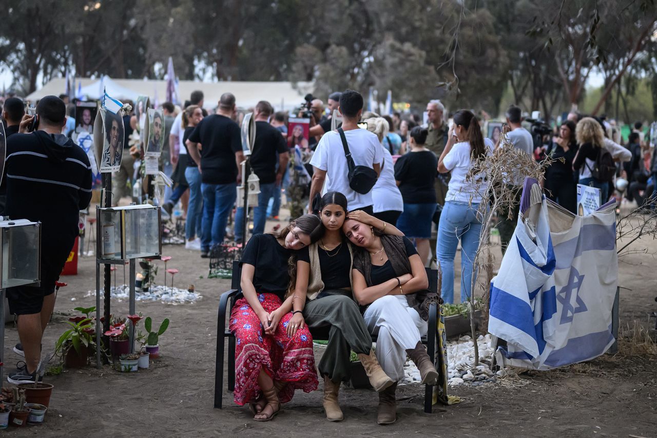 Family members and friends of the lost and kidnapped gather at the site of the Nova Festival to mark the one year anniversary of the attacks by Hamas, in Re'im, Israel on October 7.