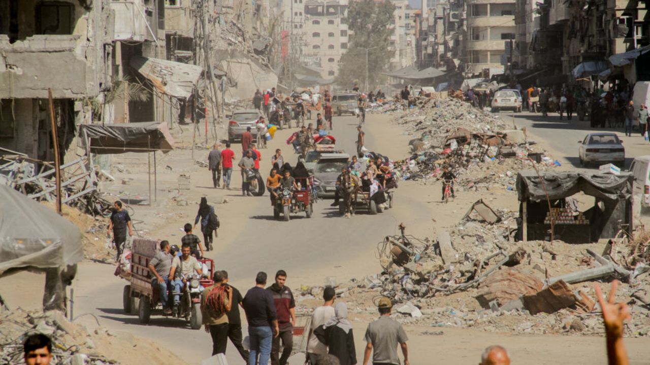 Palestinians carry their belongings as they flee areas north of Gaza City in the northern Gaza Strip on October 12, 2024. In recent days, the military has launched an intense ground and air assault in northern Gaza, particularly in and around the city of Jabalia. (Photo by Mahmoud Issa / Middle East Images / Middle East Images via AFP) (Photo by MAHMOUD ISSA/Middle East Images/AFP via Getty Images)