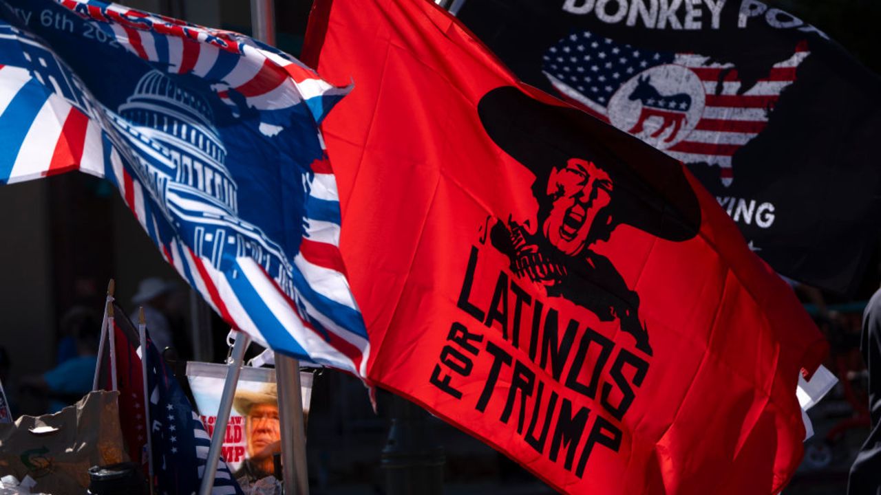 PRESCOTT VALLEY, ARIZONA - OCTOBER 13: A flag reads "Latinos for Trump" outside of U.S. Republican presidential nominee, former President Donald Trumps' rally at Findlay Toyota Center on October 13, 2024 in Prescott Valley, Arizona. With 22 days to go until election day, former President Donald Trump is campaigning in the battleground state Arizona. (Photo by Rebecca Noble/Getty Images)