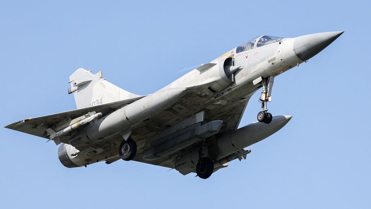 A Taiwanese Air Force Mirage 2000 fighter jet prepares to land at an air force base in Hsinchu on October 14, 2024. China deployed planes and ships to encircle Taiwan on October 14, in drills Beijing said were aimed at sending a "stern warning" to "separatist" forces on the self-ruled island. (Photo by I-Hwa CHENG / AFP) (Photo by I-HWA CHENG/AFP via Getty Images)