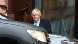 Former British Prime Minister Boris Johnson leaves Casa Rosada Presidential Palace in Buenos Aires on October 14, 2024, after meeting Argentina's President Javier Milei. (Photo by STRINGER / AFP) (Photo by STRINGER/AFP via Getty Images)