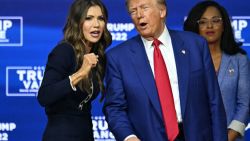 Former US President and Republican presidential candidate Donald Trump speaks with moderator and South Dakota Governor Kristi Noem during a town hall at the Greater Philadelphia Expo Center and Fairgrounds in Oaks, Pennsylvania, on October 14, 2024. (Photo by Jim WATSON / AFP) (Photo by JIM WATSON/AFP via Getty Images)