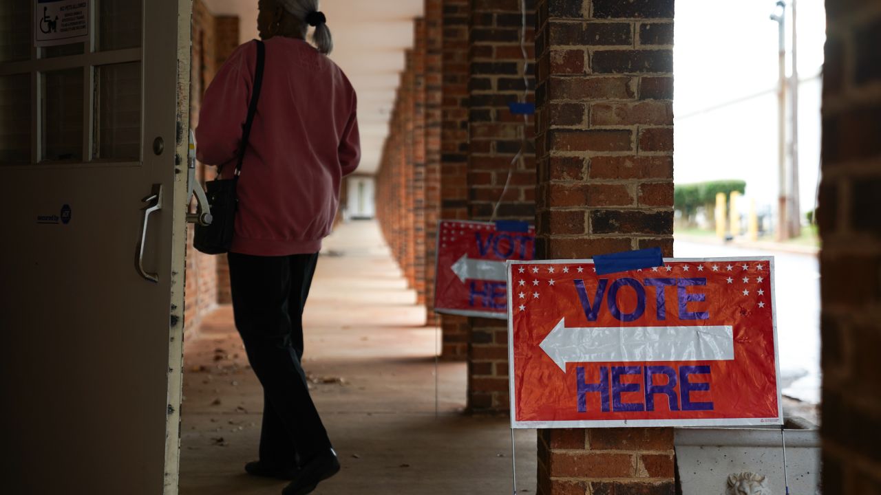 ATLANTA, GEORGIA - OCTOBER 15: People arrive to cast their votes on the first day of early voting at East Point First Mallalieu United Methodist Church on October 15, 2024 in Atlanta, Georgia. Early voting takes place from October 15 - November 1, ahead of Election Day on November 5. (Photo by Megan Varner/Getty Images)