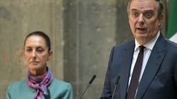 Mexican Economy Minister Marcelo Ebrard (R) speaks next to Mexican President Claudia Sheinbaum during the High Level Summit between Mexican and US leaders and businessmen at the National Palace in Mexico City on October 15, 2024. (Photo by Yuri CORTEZ / AFP) (Photo by YURI CORTEZ/AFP via Getty Images)